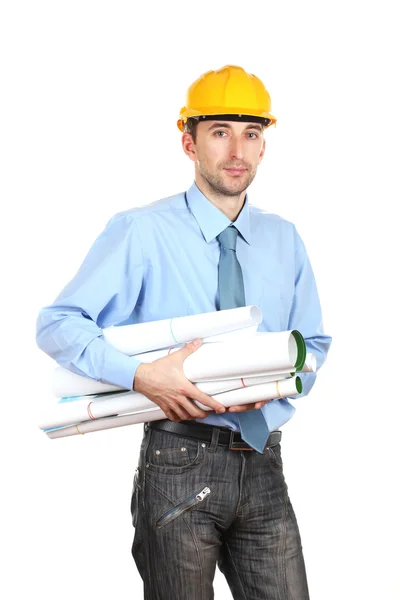 Молодой человек архитектор со шлемом и черновиками изолирован на белом — стоковое фото