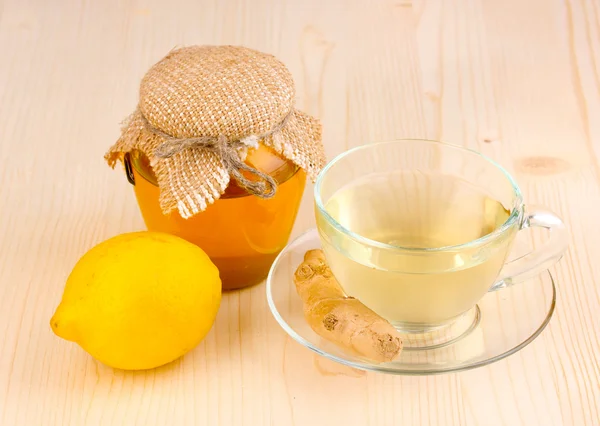 Υγιή τζίντζερ τσάι με λεμόνι και μέλι σε ξύλινα φόντο — Φωτογραφία Αρχείου