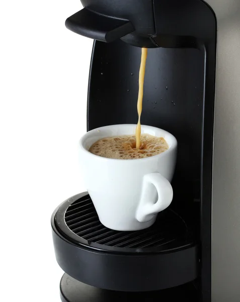 Máquina de café expreso vertiendo café en taza aislada en blanco — Foto de Stock