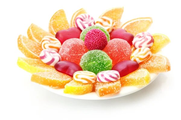 Colorful jelly candies on plate isolated on white — Stock Photo, Image