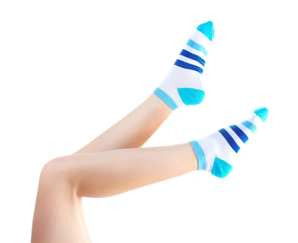 Female legs in striped socks isolated on white — Stock Photo, Image