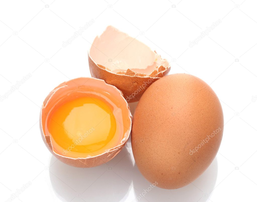 Brown eggs with yolk isolated on white
