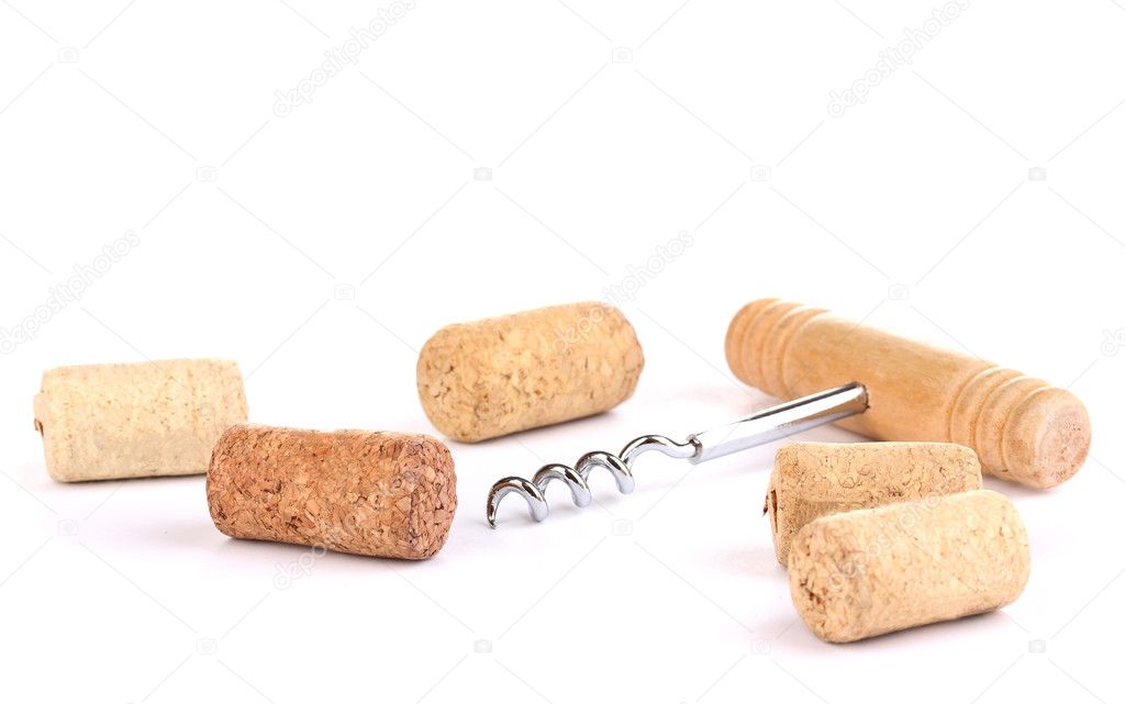 Corkscrew with wine corks isolated on white