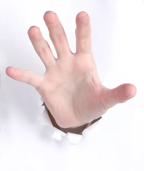 Hand breaking through the paper — Stock Photo, Image