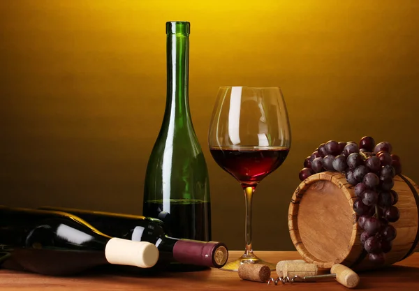 In wine cellar. Composition of wine bottles and runlet — Stock Photo, Image