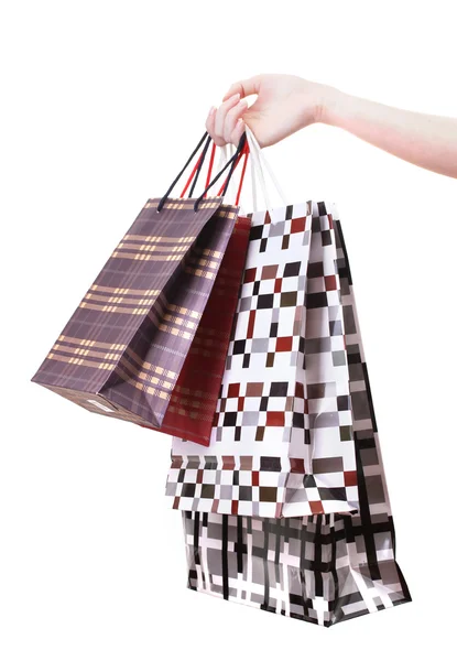 Ręka gospodarstwa jasny torby na zakupy na białym tle — Zdjęcie stockowe