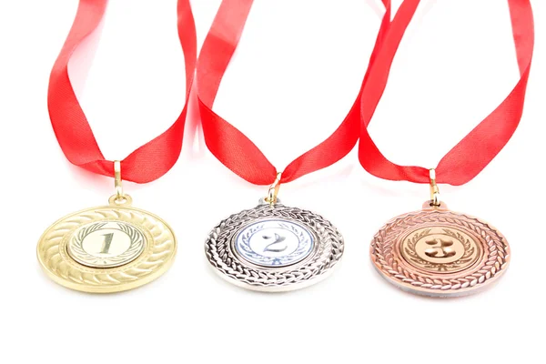 Три медали выделены на белом — стоковое фото