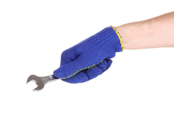 Chave na mão com luva de proteção isolada em branco — Fotografia de Stock