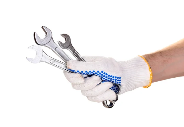 Wrenches in hand with protection glove isolated on white — Stock Photo, Image
