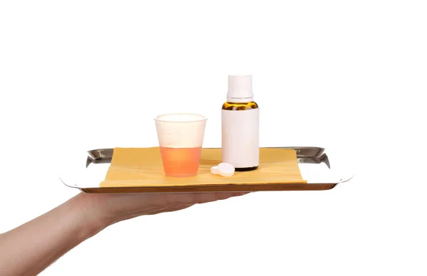 Bandeja de mão com medicamentos isolados em branco — Fotografia de Stock