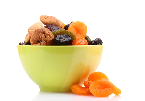 stock image Dried fruits in green bowl isolated on white