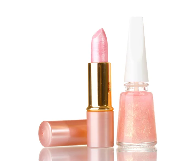 Roze lippenstift en beige nagellak met sparkles geïsoleerd op wit — Stockfoto