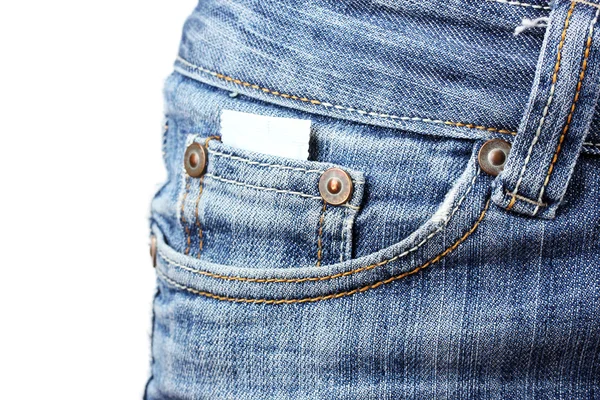 白底蓝色牛仔裤口袋里的避孕套 — 图库照片