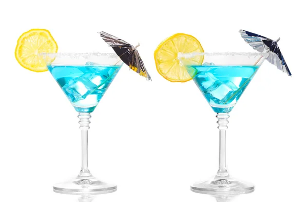 Blue cocktail in martini glasses isolated on white — Stock Photo, Image