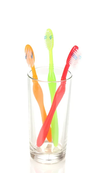 Toothbrushes in glass isolated on white — Stock Photo, Image