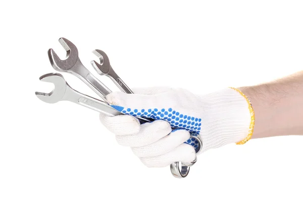 Klíče v ruce s ochranou rukavici izolované na bílém — Stock fotografie