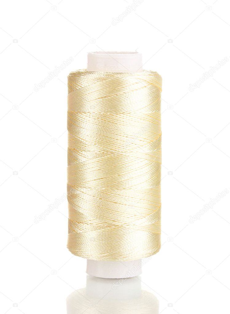 Gold bobbin thread isolated on white