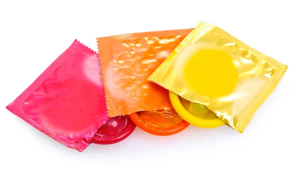Красочные презервативы, изолированные на белом — стоковое фото