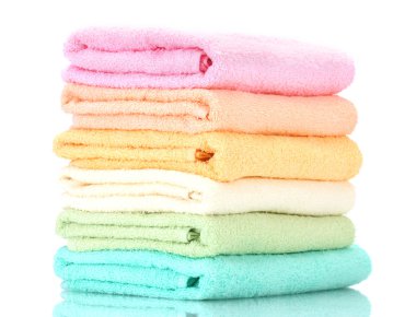 Colorful towels isolated on white clipart