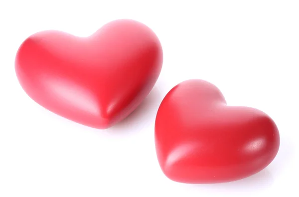 Zwei dekorative rote Herzen isoliert auf weiß — Stockfoto