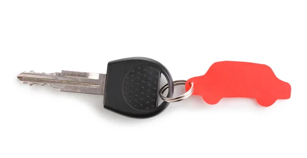 Car key with charm isolated on white — Stock Photo, Image