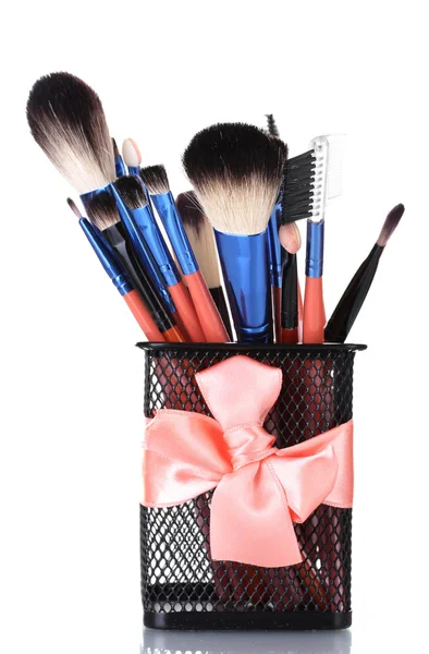 Make-up brushes in holder isolated on white — Stok fotoğraf