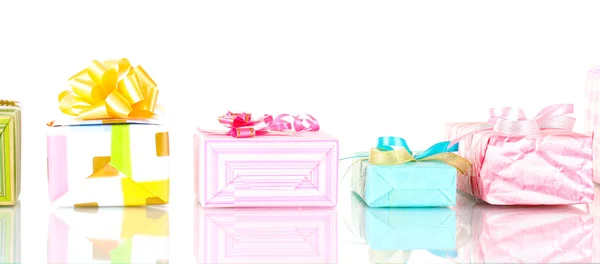 Mooie lichte geschenken geïsoleerd op wit Stockfoto
