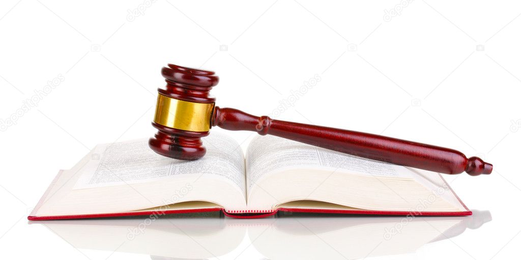 Judge's gavel and open book isolated on white
