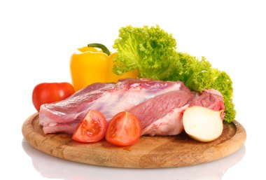 Raw meat and vegetables on a wooden board isolated on whitе clipart