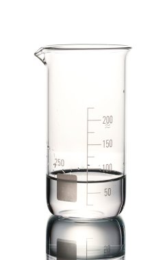 Measuring beaker with water and reflection isolated on white clipart