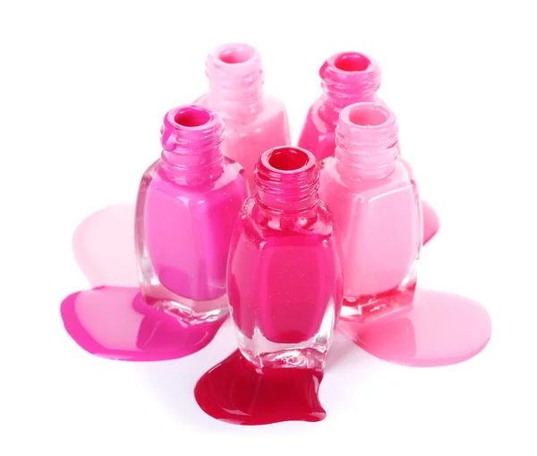 Botellas abiertas con esmalte de uñas brillante aislado en blanco —  Fotos de Stock