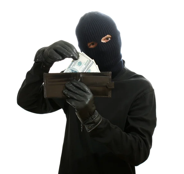 Bandido em máscara preta com carteira roubada isolada em branco — Fotografia de Stock