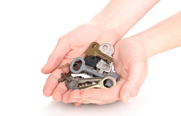 Molte chiavi in mani isolate su bianco — Foto Stock
