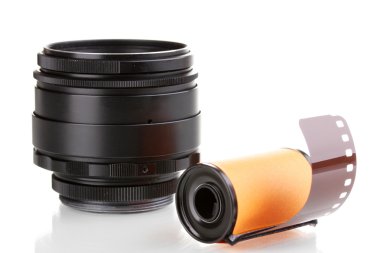 New photo film in cartridge and camera lens isolated on white clipart