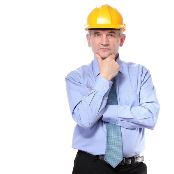 Человек-архитектор со шлемом изолирован на белом — стоковое фото