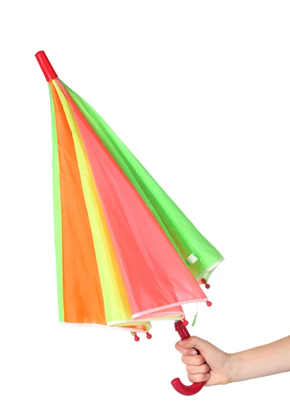 Closed multi-colored umbrella in hand isolated on white — Stock Photo, Image