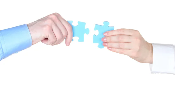 Hands with puzzle isolated on white — Stock Photo, Image