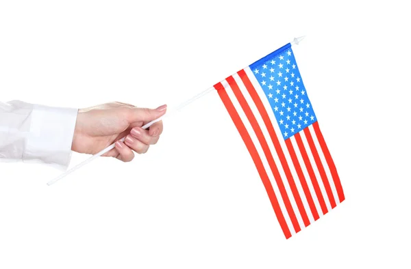Mão feminina com bandeira americana isolada em branco — Fotografia de Stock