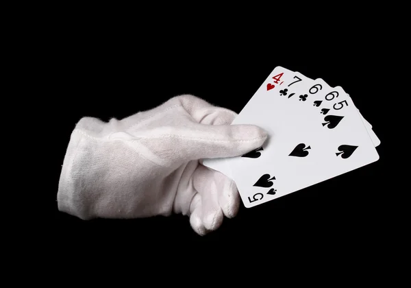 Karty w ręku izolowane na czarno — Zdjęcie stockowe
