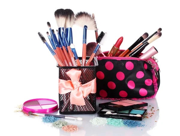 Make-up brushes in holder and cosmetics isolated on white — Stock Photo, Image