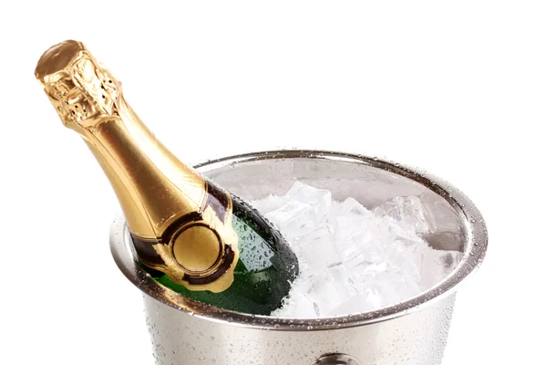 Fles champagne in emmer geïsoleerd op wit — Stockfoto