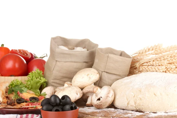 stock image Delicious pizza, dough and vegetables isolated on white