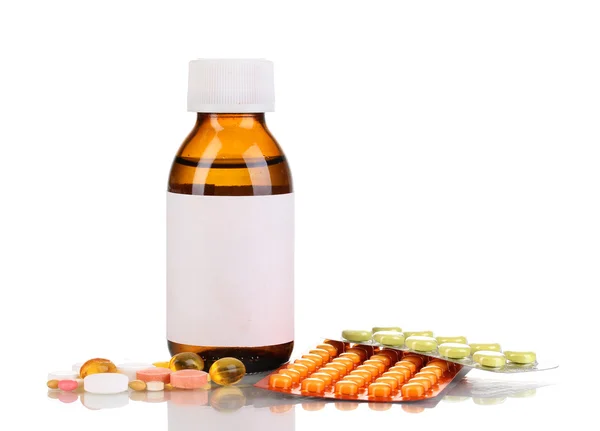Lékařská láhev a tablety izolovaných na bílém — Stock fotografie