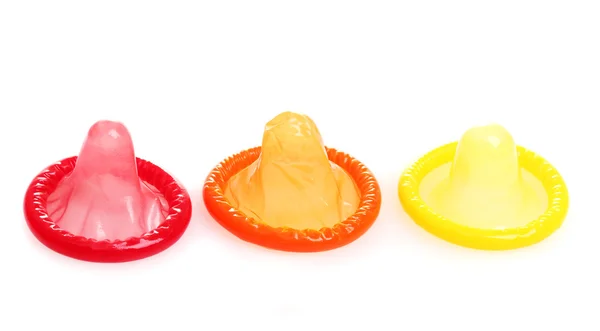 Preservativos coloridos aislados en blanco —  Fotos de Stock