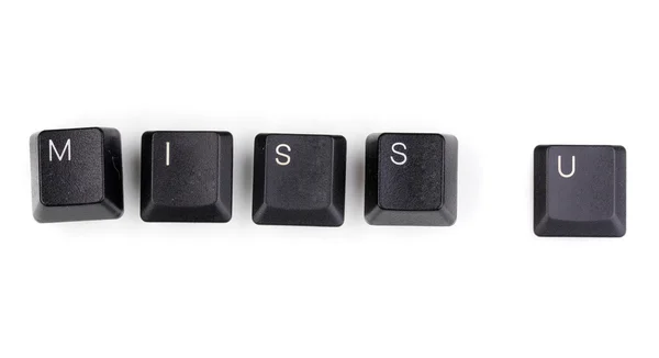 Toetsenbordtoetsen zeggen mis je geïsoleerd op wit — Stockfoto