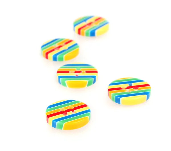 Bright striped sewing buttons isolated on white — Stock Photo, Image