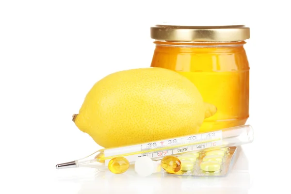 Honey, lemon and thermometer isolated on white — Stock Photo, Image