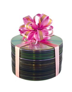 Stack of CD disks with gift lace over white clipart