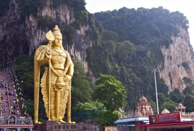 Murugan statue at the Batu Caves, Kuala Lumpur clipart