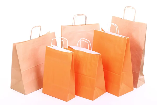 Compras ORANGE bolsas de regalo aisladas — Foto de Stock
